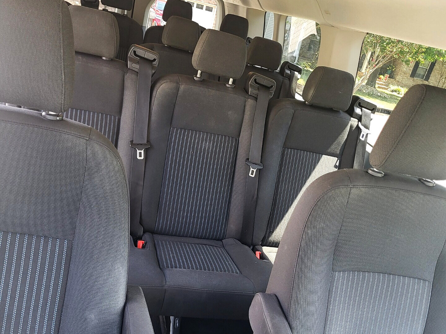 Inside the Ford Transit 350 XLT — seating for up to fourteen passengers
