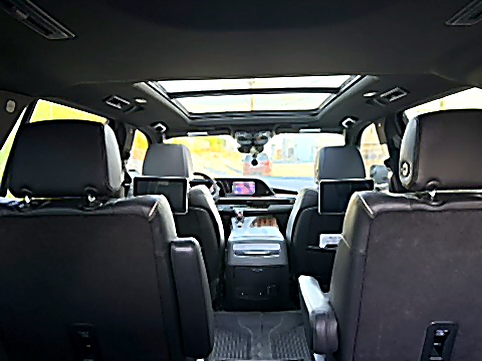 Cadillac Escalade interior with rear-seat screens — Nashville chauffeur service