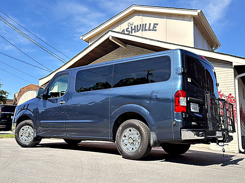 Passenger van loading luggage for a Nashville airport group transfer