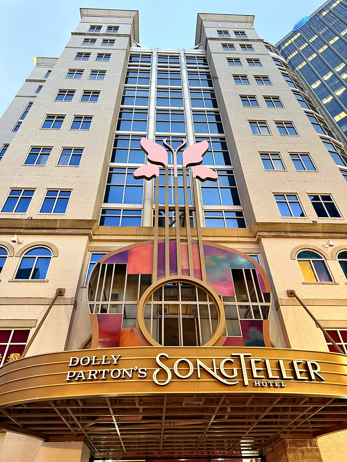 Dolly Partons Songteller Hotel entrance and guitar facade in downtown Nashville