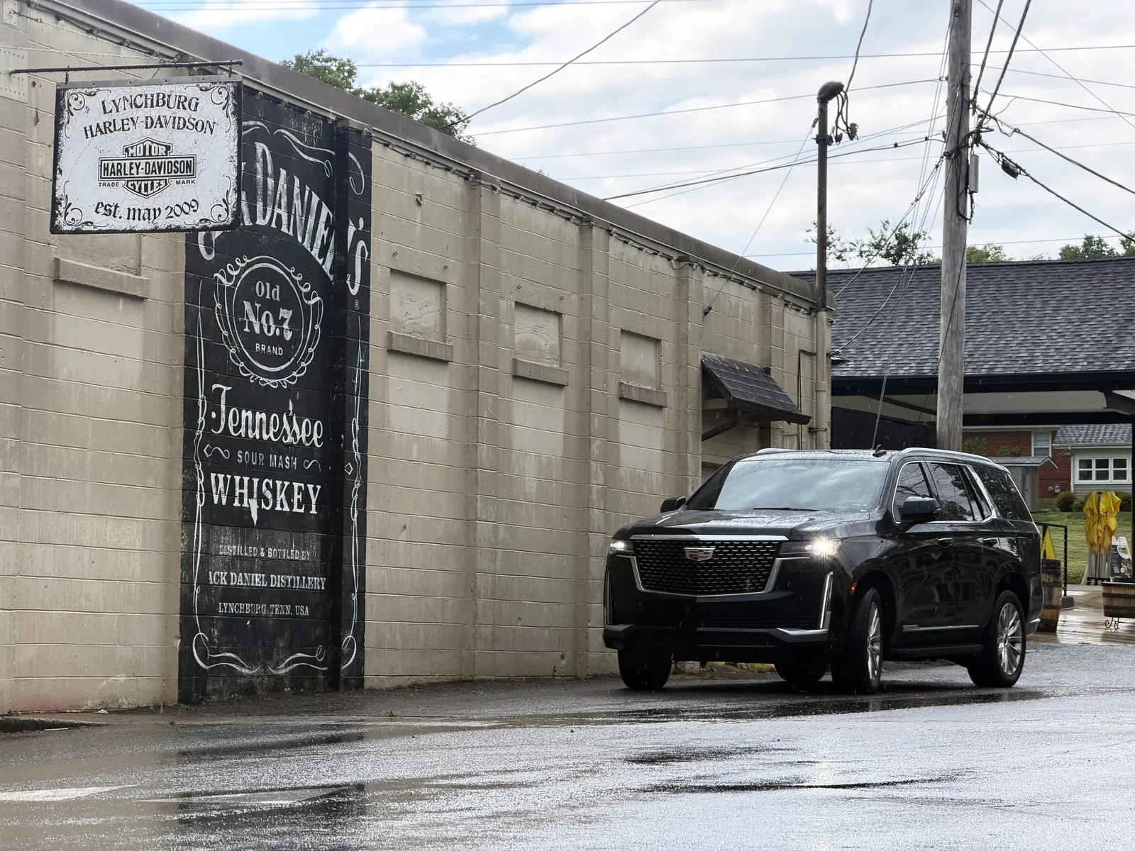 Black SUV beside an Old No. 7 mural in Lynchburg