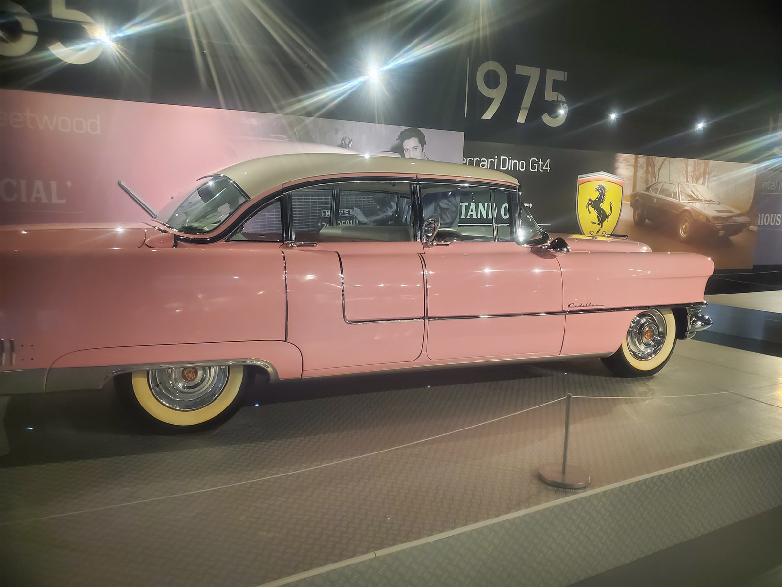 Pink Cadillac with a cream roof displayed in the automobile exhibit at Graceland
